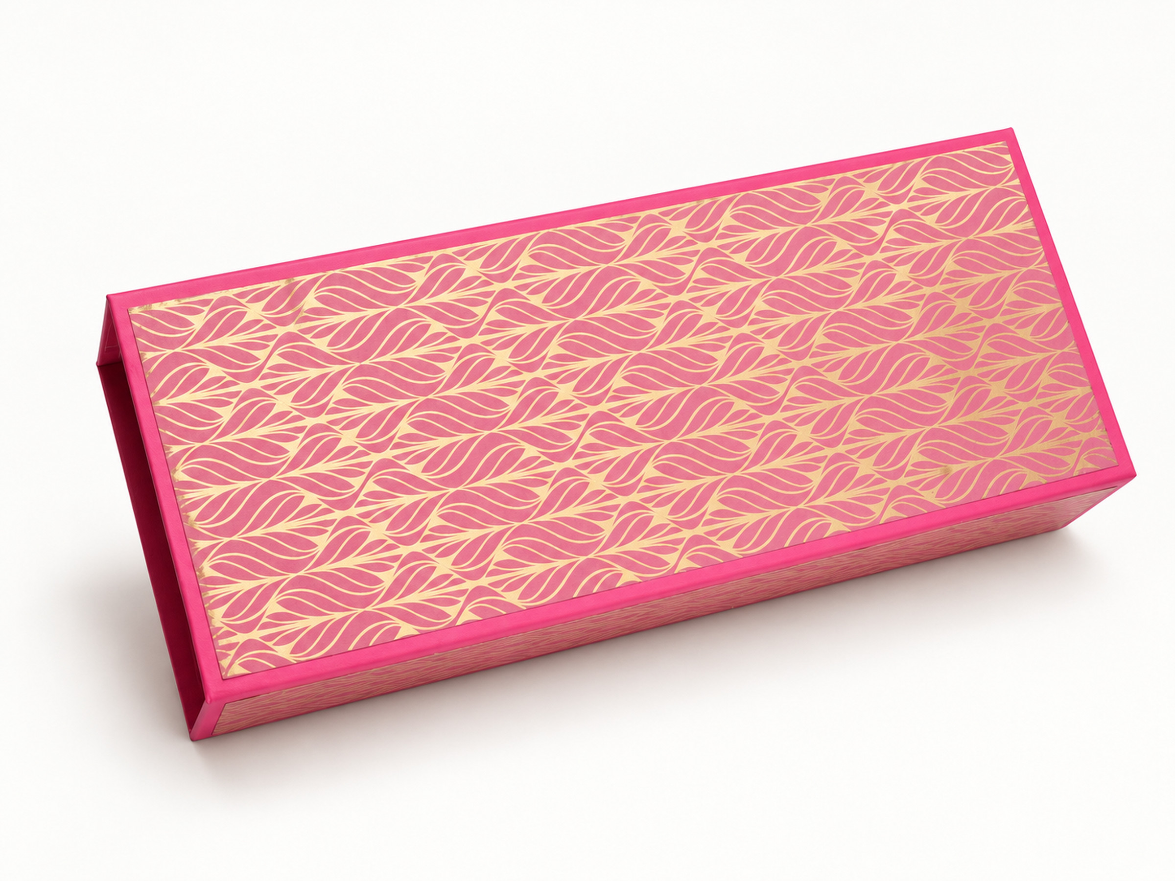 Closed rectangular pink gift box with a gold leaf pattern across its long lid.