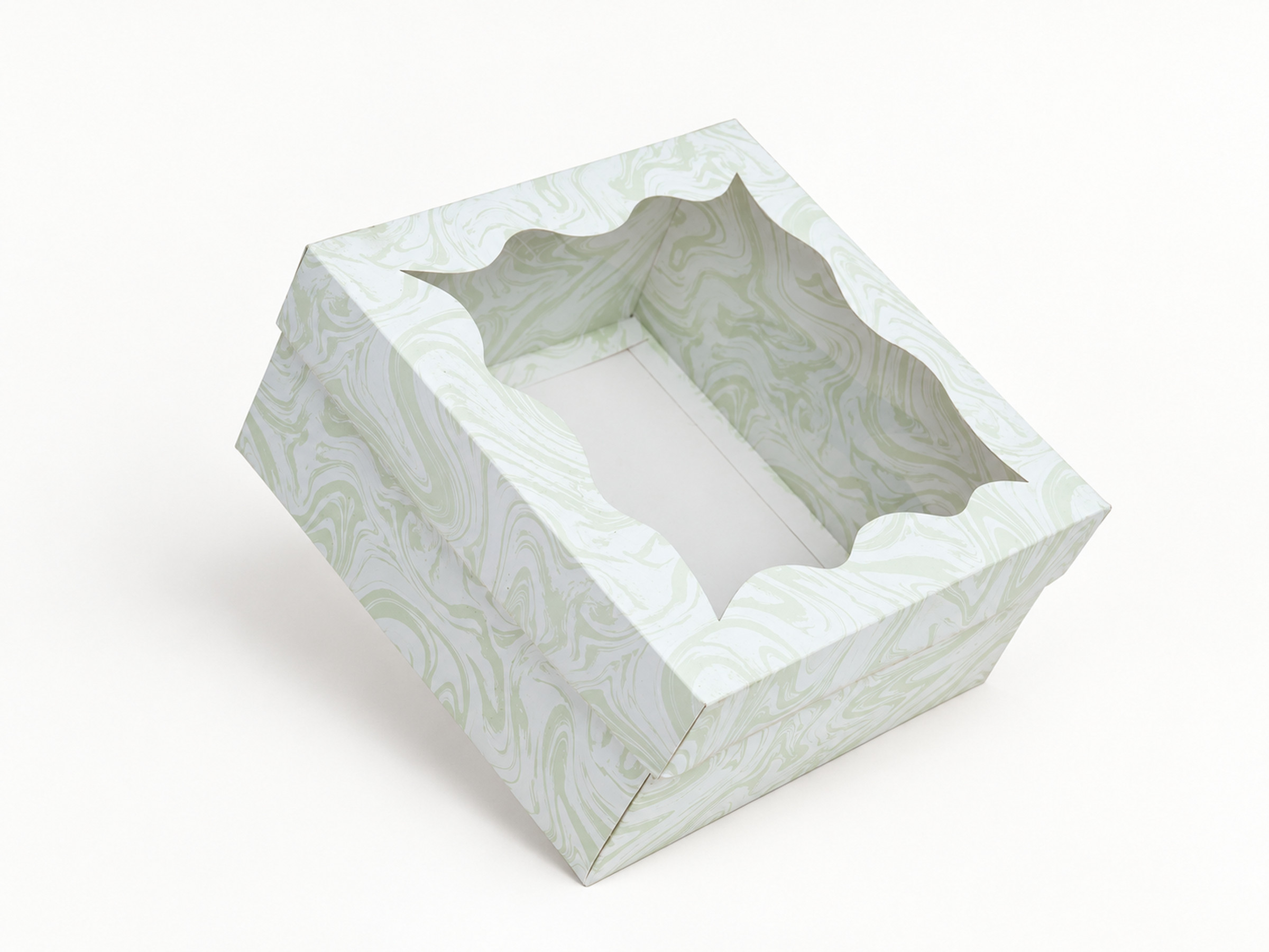Sage green and ivory swirl gift box with a scalloped window lid, shown from a three-quarter angle.